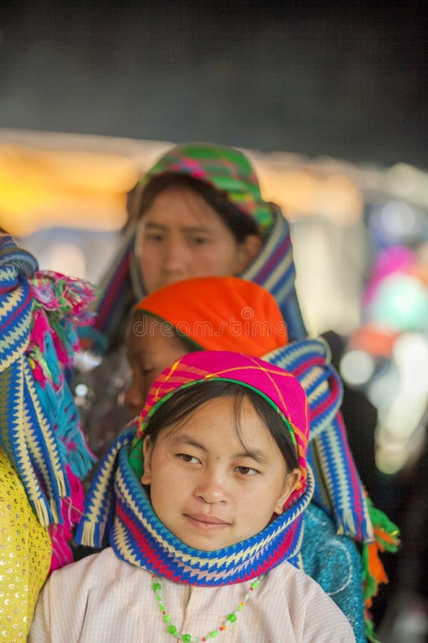 Ethnic minority woman smiling, at old Van market, Ha Giang province, Vietnam. Ha Giang is one of the six poorest provinces of Vietnam. Ha Giang is a famous tourist destination in Vietnam. Photo taken on: 03 May 2011. Ethnic minority woman smiling, at old Van market, Ha Giang province, Vietnam. Ha Giang is one of the six poorest provinces of Vietnam. Ha Giang is a famous tourist destination in Vietnam. Photo taken on: 03 May 2011