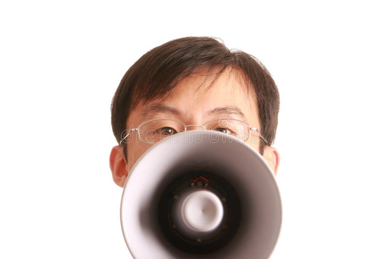 Lächelnder junger Mann und Megaphon stockfoto Lächelnder junger Mann und Megaphon stockfoto