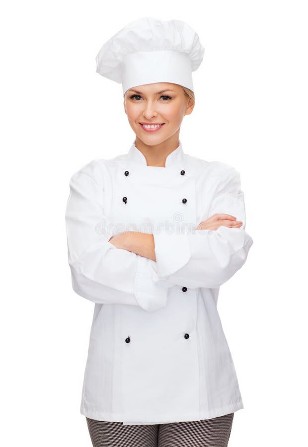 Lächelnder weiblicher Chef mit den gekreuzten Armen stockfotografie Lächelnder weiblicher Chef mit den gekreuzten Armen stockfotografie