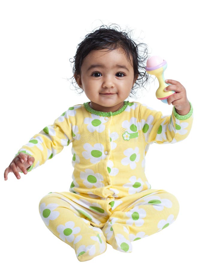 Lächelndes Baby, das mit Geklapper spielt lizenzfreies stockbild