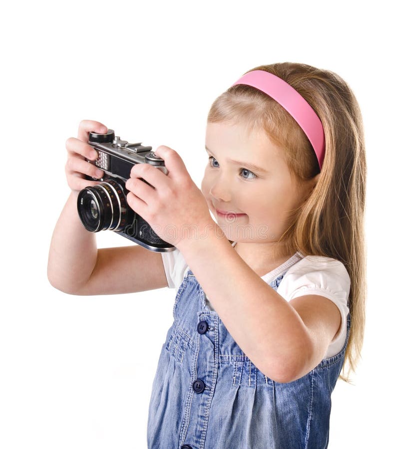 Lächelndes kleines Mädchen mit der alten Kamera getrennt stockfoto Lächelndes kleines Mädchen mit der alten Kamera getrennt stockfoto