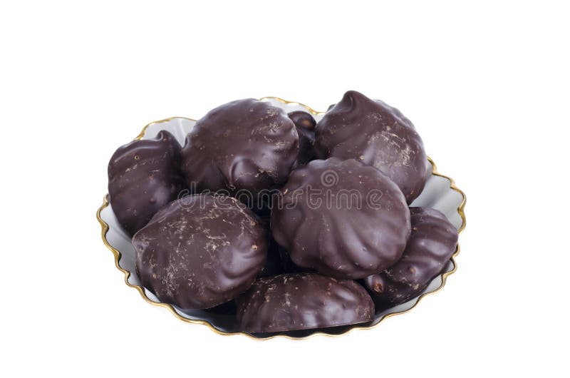 Läckra marshmallower i choklad på plattan white f?r bakgrundschickpeabild royaltyfri fotografi Läckra marshmallower i choklad på plattan white f?r bakgrundschickpeabild royaltyfri fotografi