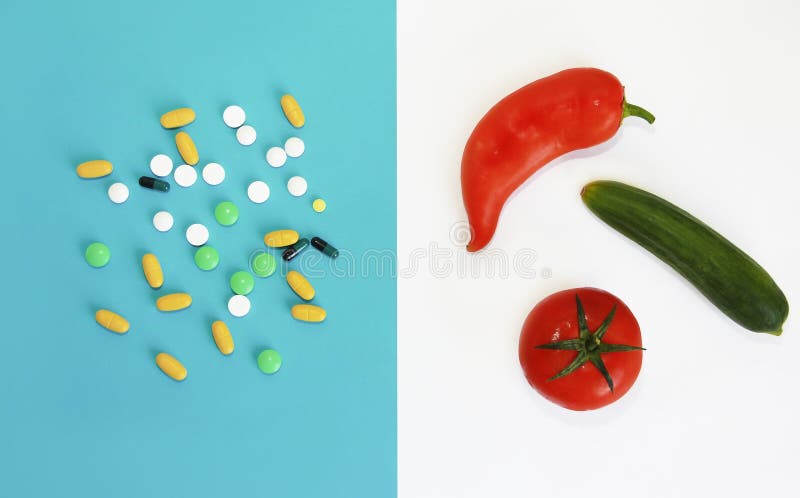 Läkemedel i form av tabletter och färska grönsaker, tomatgurkpeppar