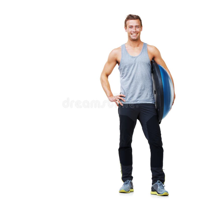 Lämplighet för portrait halv kula och glad man för välfärdighetsstudio eller pilatprestanda med gym utrustning. röra fotografering för bildbyråer