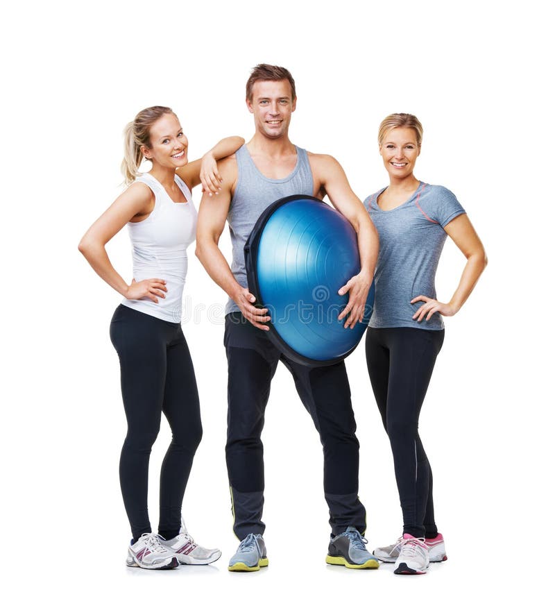 Lämplighet för portrait halv kula och glada personer för välfärdighetsstudio eller pilatklass med gym utrustning. grupp royaltyfri bild