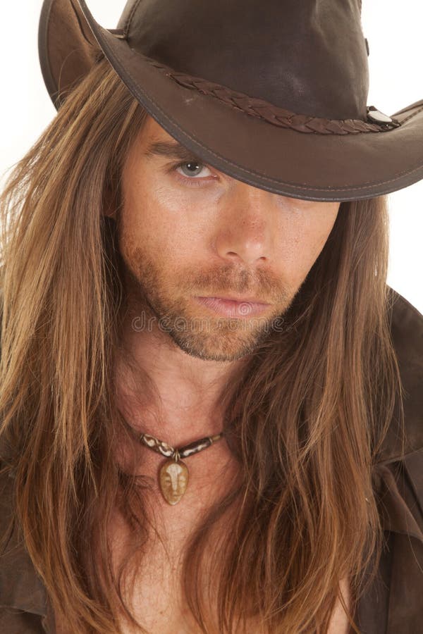 Långt allvarligt hårslut för cowboy royaltyfri bild