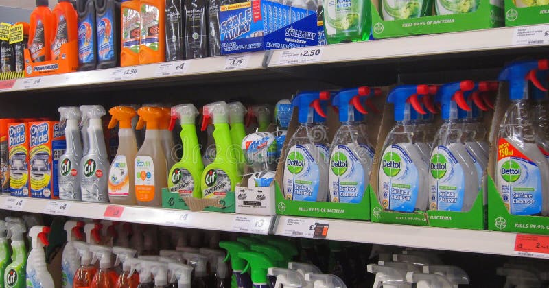 Various bottles of cleaning liquid for sale on display in a shop or a store. Various bottles of cleaning liquid for sale on display in a shop or a store.