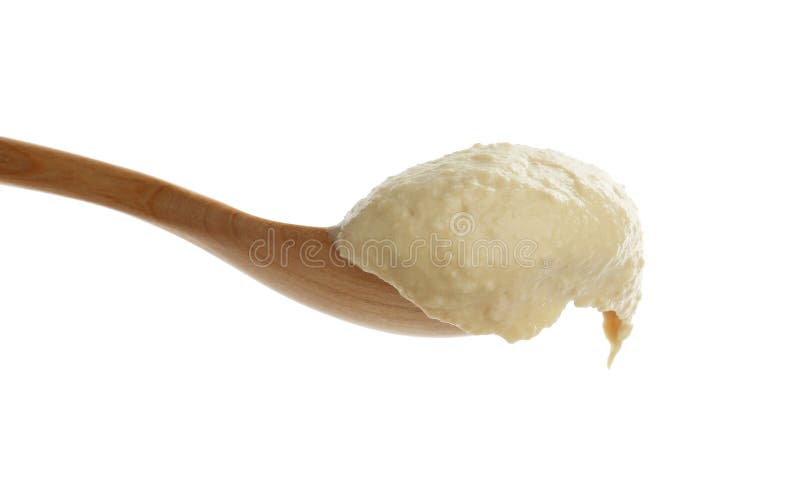 Löffel mit köstlichem Hummus isoliert auf weiß stockfoto