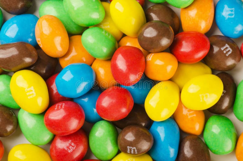 M&M`s candies, Close up of a pile of colorful chocolate coated candy
