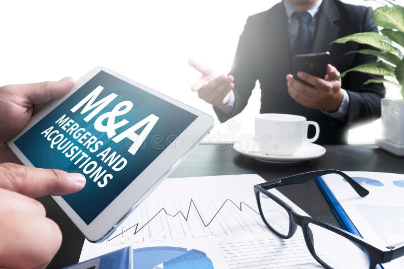 M&A (MERGERS AND ACQUISITIONS) stock photo M&A (MERGERS AND ACQUISITIONS) stock photo