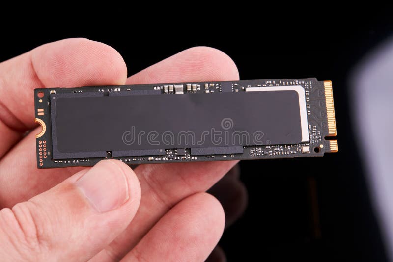 M.2 NAND SSD solid state drive technology. engineer person hold hardware device to upgrade desktop or laptop. M.2 NAND SSD solid state drive technology. engineer person hold hardware device to upgrade desktop or laptop.