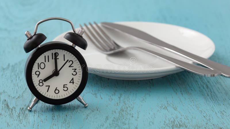 Intermittent fasting concept with clock, white plate, fork and knife on blue table. Intermittent fasting concept with clock, white plate, fork and knife on blue table