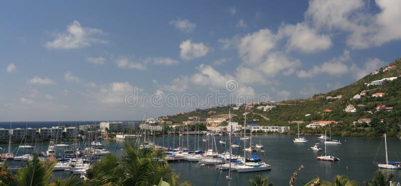 A view of sailboats in port on the eastern side of St. Maarten. A view of sailboats in port on the eastern side of St. Maarten.