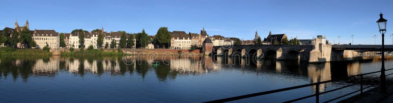 View across the Mass at the St. Servaasbrug bridge and the medieval town of Maastricht, in the Netherlands. View across the Mass at the St. Servaasbrug bridge and the medieval town of Maastricht, in the Netherlands.