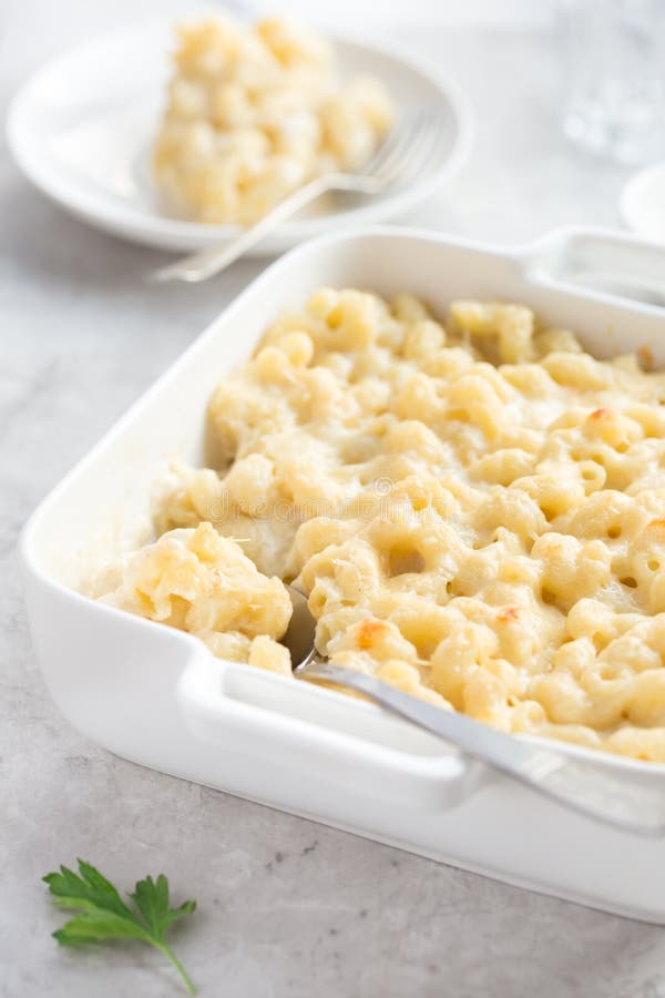 Mac & Cheese, Baked Macaroni and Cheese in White Casserole Dish Stock