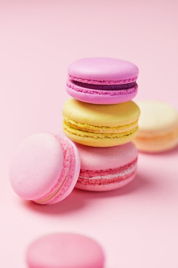 Macarons. Colorful Macaroons on Pink Background Stock Photo - Image of ...