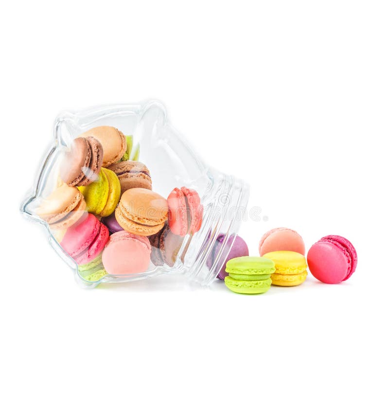 Macarons franceses coloridos num frasco de vidro imagem de stock