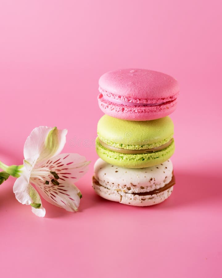 Macarons of Different Color on Pink Background Vertical Stock Photo ...