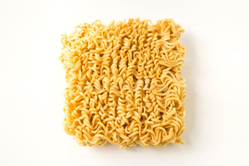 Macarronete imediato seco no fundo branco foto de stock royalty free Macarronete imediato seco no fundo branco foto de stock royalty free