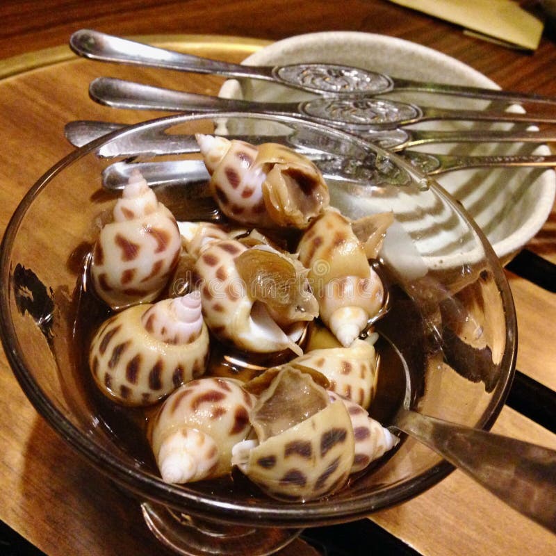 Display of Favorite Dish of Snails in a Restaurant in Macau Stock Photo