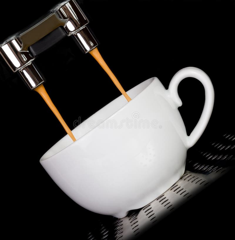 Coffee machine pouring espresso in cup. Coffee machine pouring espresso in cup