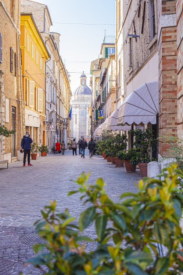 Macerata, Italy - February 21, 2021: People enjoying sunny day