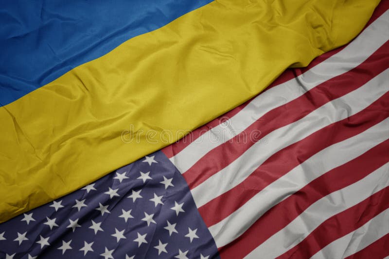 machać kolorową flagę zlani stany America i flaga państowowa Ukraine Makro-