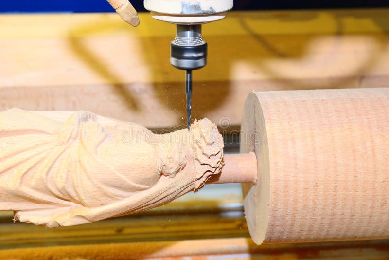 CNC drilling machine is machining wood billet. Closeup machine tool stock images, royalty-free photos and pictures