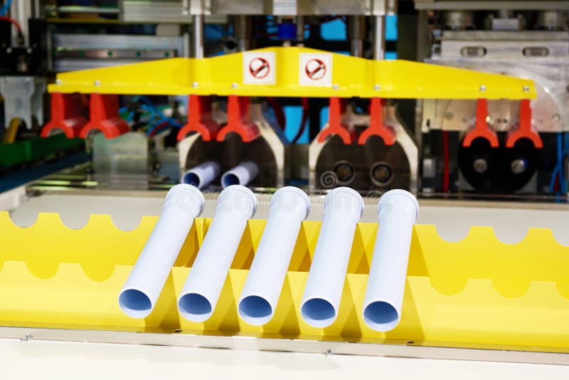 Machine en plastique moderne de tuyau image stock Machine en plastique moderne de tuyau image stock