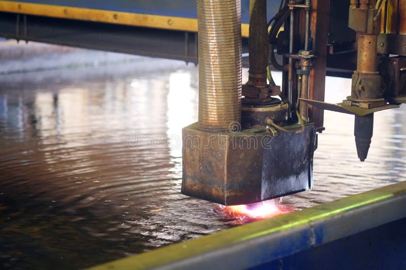 Machine for the laser cutting metal in water royalty free stock images Machine for the laser cutting metal in water royalty free stock images