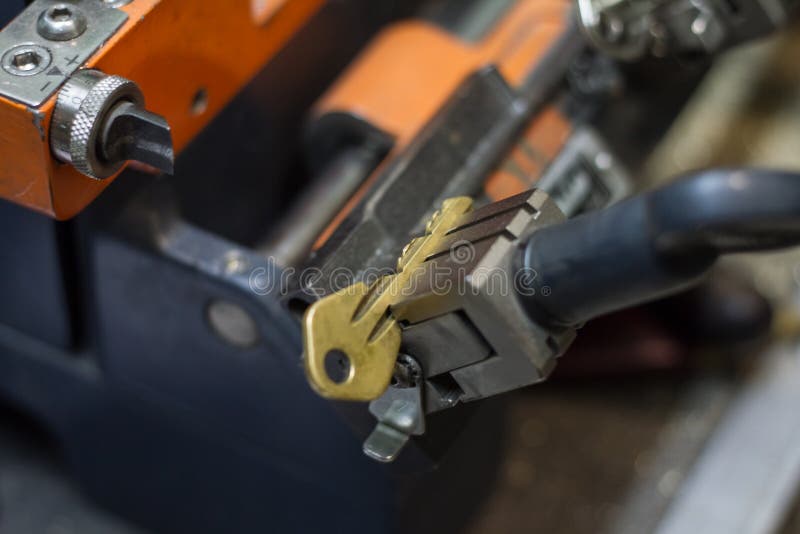 Machine production of duplicate metal key.