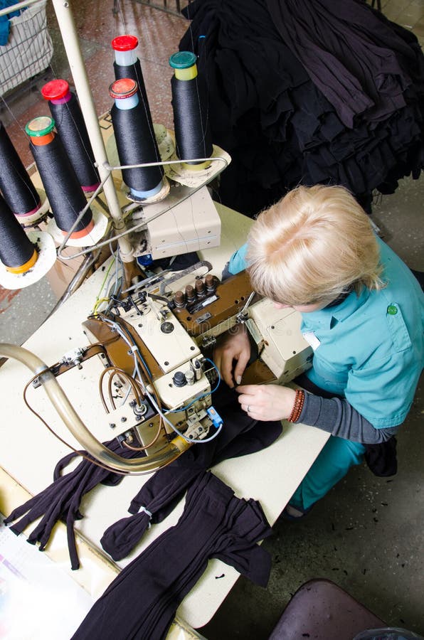 Machinery and equipment in a spinning production company interior design. Textile fabric royalty free stock photography Machinery and equipment in a spinning production company interior design. Textile fabric royalty free stock photography