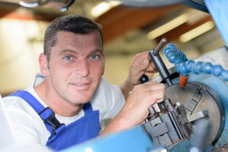 Machinist at work stock image. Image of shop, pose, vocation 173082449