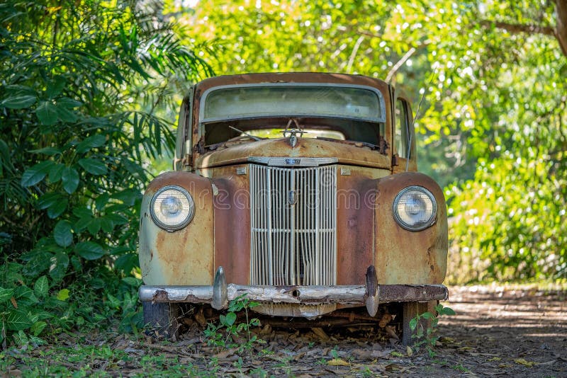 Rusty Old Car Abandoned In A Forest