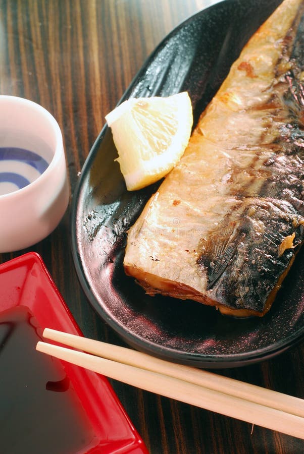 Pan-fried Mackerel with Lemon juice royalty free stock photo