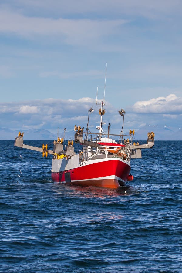 Commercial fishing boat 1516 Fjóla GK-121 at mackerel fishing near the south west coast of Iceland. Commercial fishing boat 1516 Fjóla GK-121 at mackerel fishing near the south west coast of Iceland.