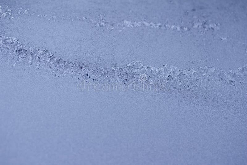 Macro abstract texture of beautiful ice patterns on a frosted window pane stock images Macro abstract texture of beautiful ice patterns on a frosted window pane stock images