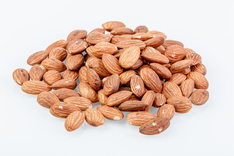 Macro almond nuts on a white background