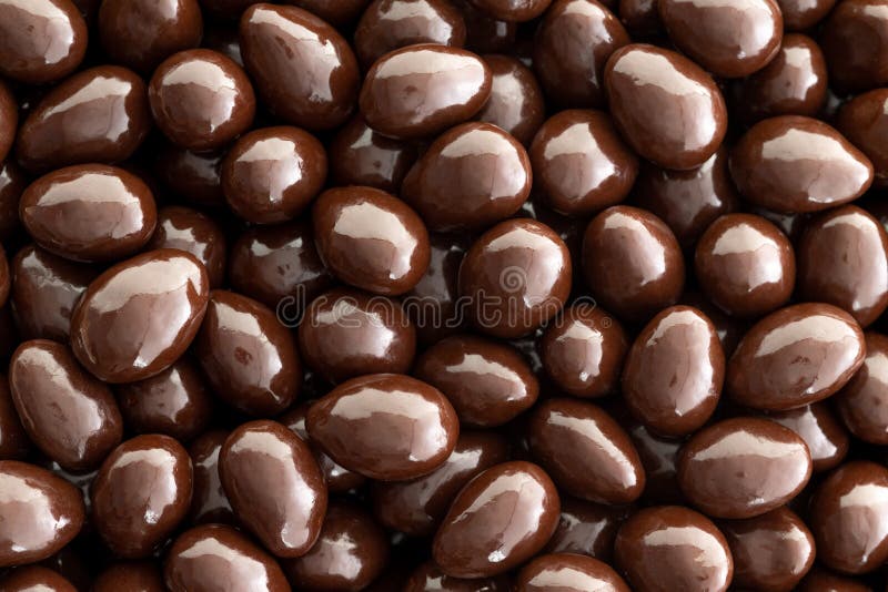 Macro background texture of chocolate almonds