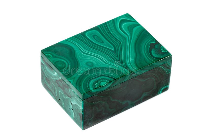 Macro cajas de la malaquita en el fondo blanco imagen de archivo libre de regalías