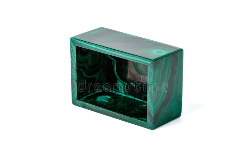 Macro cajas de la malaquita en el fondo blanco fotografía de archivo