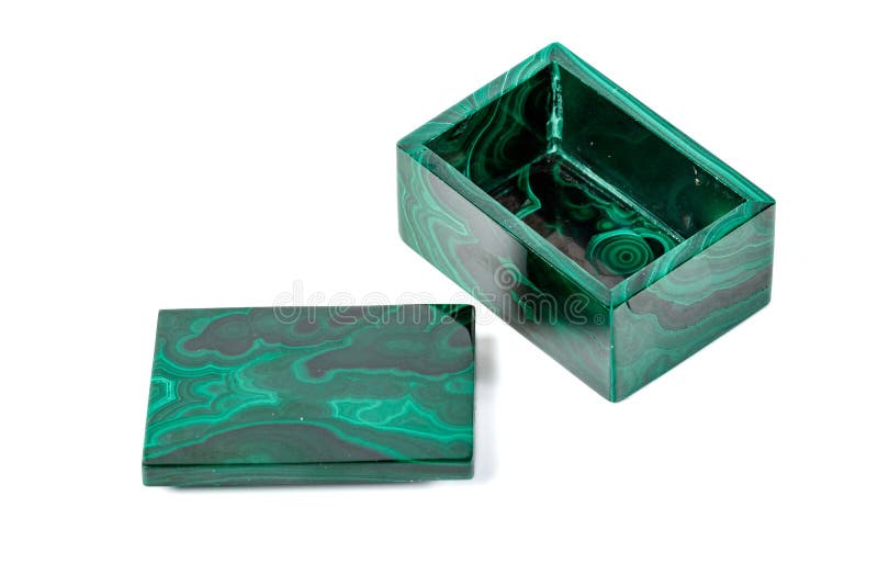 Macro cajas de la malaquita en el fondo blanco imágenes de archivo libres de regalías