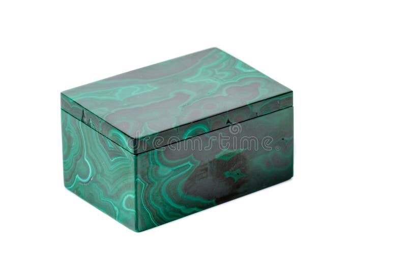 Macro cajas de la malaquita en el fondo blanco imagen de archivo libre de regalías