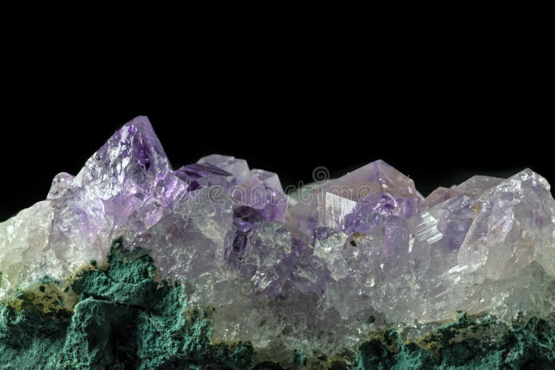Macro close-up of an amethyst mineral crystal cluster stock images