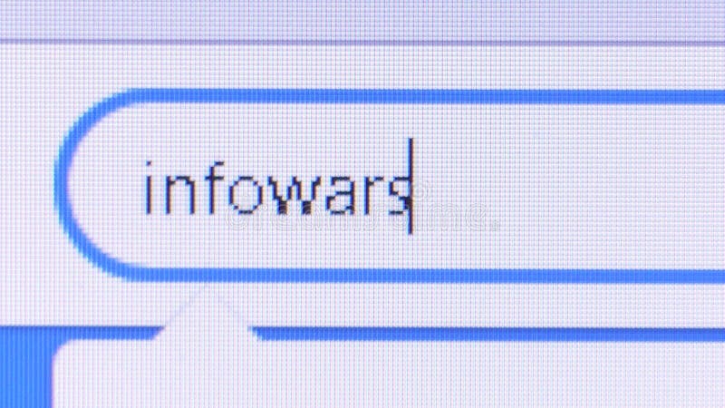 Macro close up of the name `Infowars` being typed into the search bar on Twitter. stock video footage