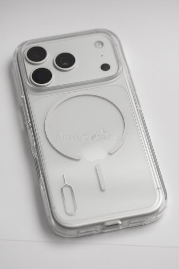 Close-up of new iPhone 17 Pro with transparent MagSafe case on white background, sleek modern smartphone technology design royalty free stock images