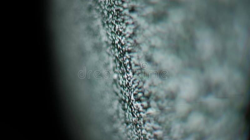 Macro Close-Up of TV Static Noise Flicker on Screen Angle View stock footage