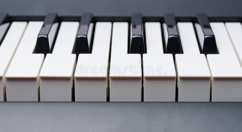 Macro close up view of piano keys stock photo