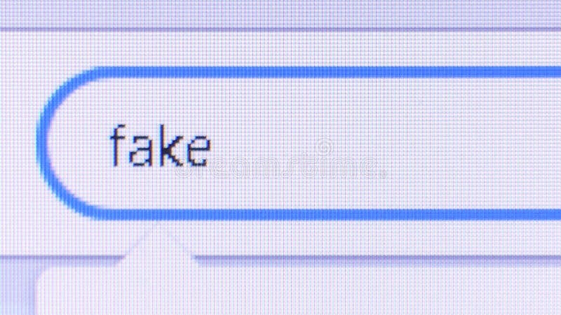 Macro close up of the words `fake news` bring typed into Twitter search bar stock video