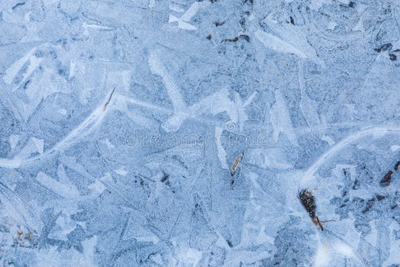 The macro or closeup shot of ice texture or background on the puddle or pool royalty free stock photo The macro or closeup shot of ice texture or background on the puddle or pool royalty free stock photo